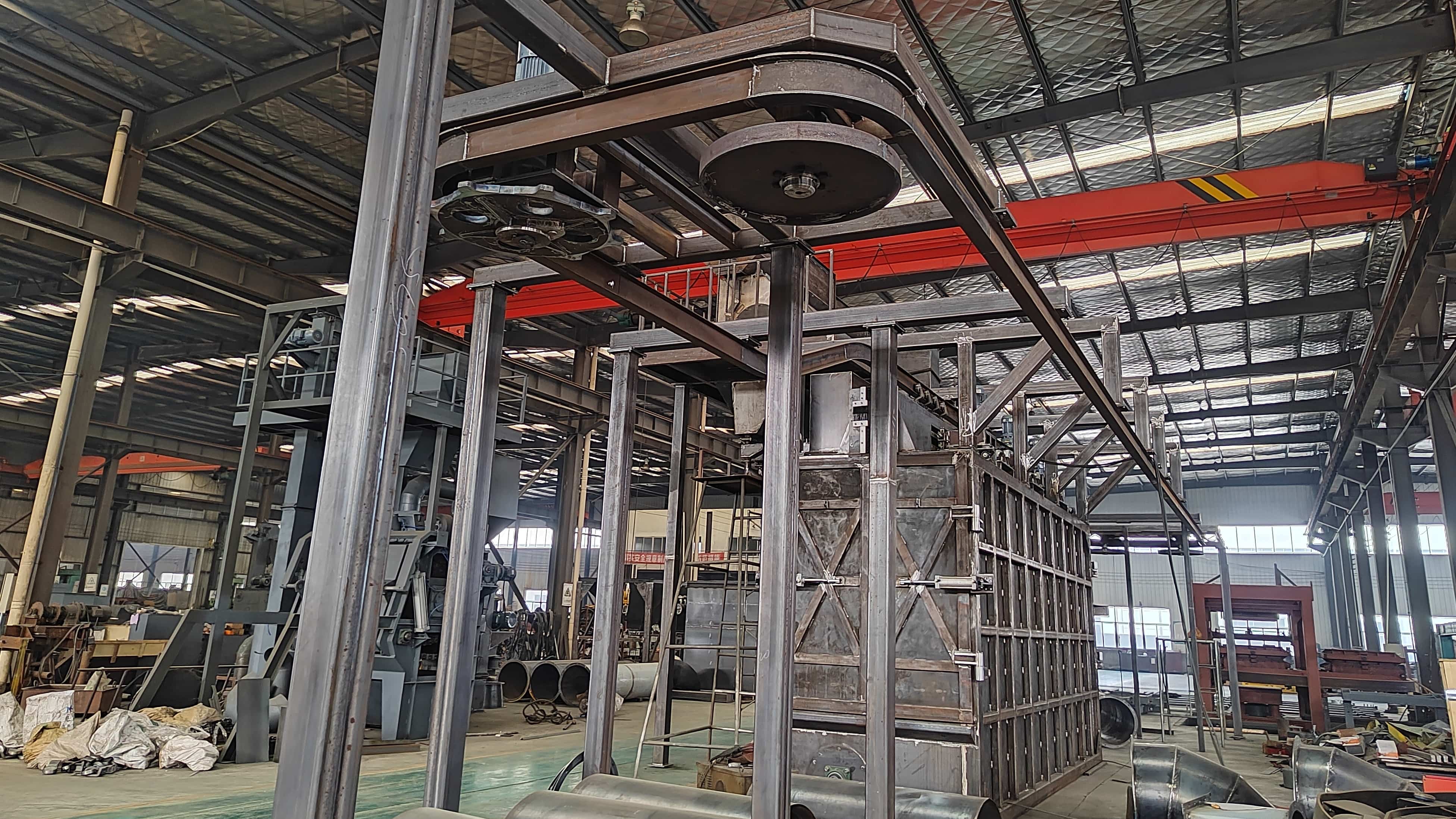 Overhead conveyor shot blasting machine installed production line view